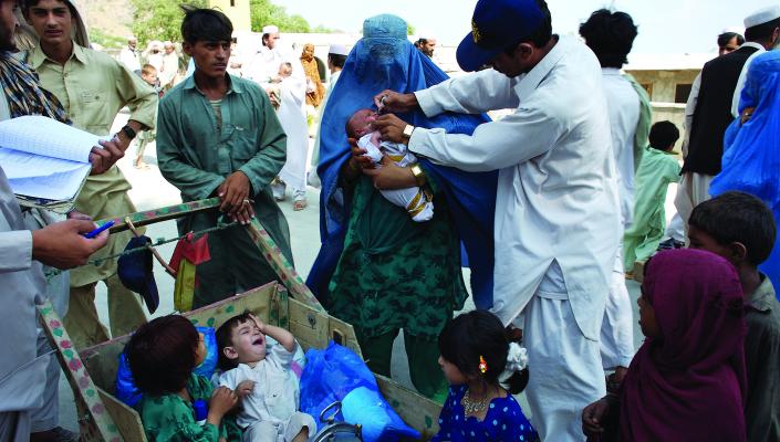 Field doctors attend to children in a crisis situation