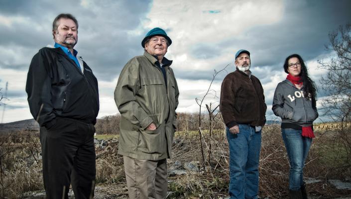 Citizens united: Bob Roberson, Bill Krantz, Jim Krantz and Jennifer Peppe Hahn gather outside Fort Detrick’s Area B in central Maryland. December 11, 2012.