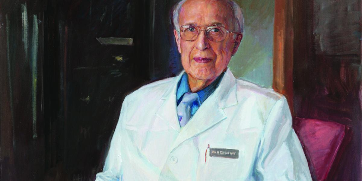 Painting of George Comstock, seated, wearing a lab coat