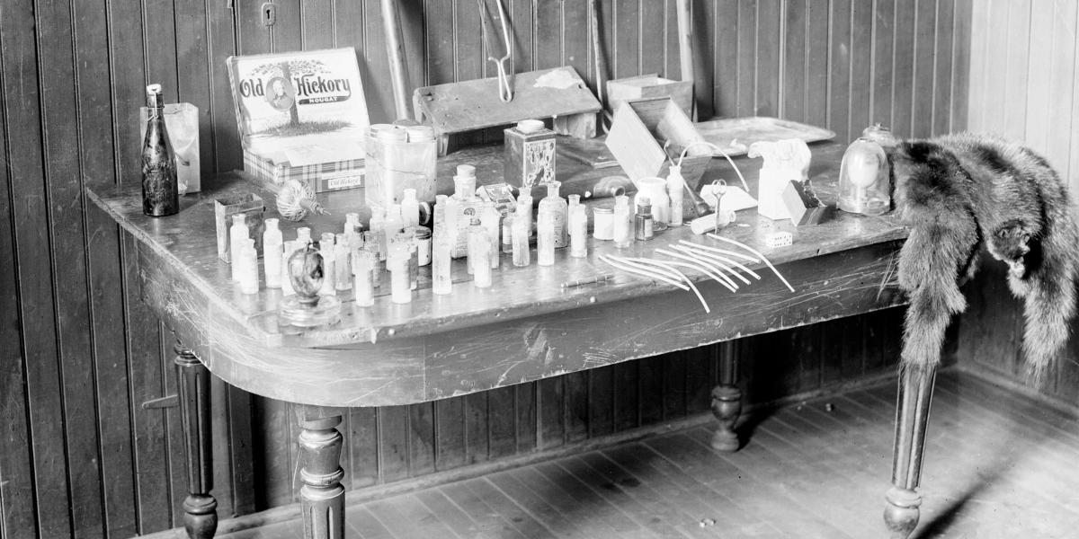  Image of a table containing cocaine, opium, and morphine taken from “dope fiends” in Chicago, Illinois, 1908. Photo by Chicago Sun-Times/Chicago Daily News collection/Chicago History Museum/Getty