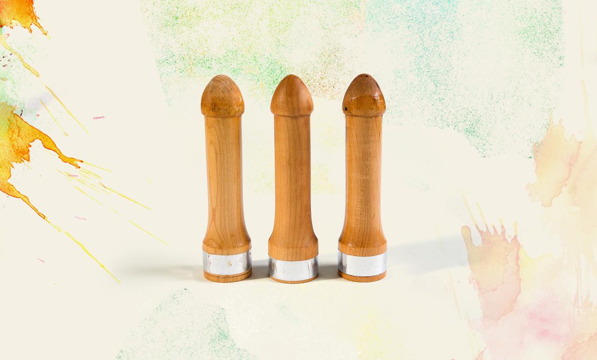 3 wooden phalluses